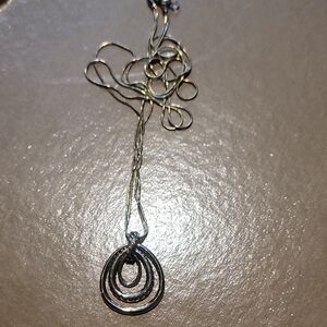 Elegant Gold and Silver Pendant Necklace